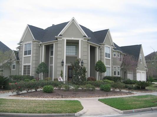 power washing stucco home in Katy Texas after