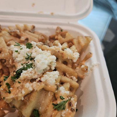 Spicy aoli, queso, feta waffle fries