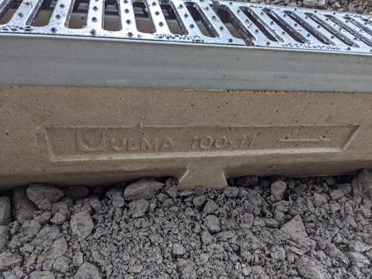 ULMA ULK100 trench drain single section installed for $500 upcharge mid-job.