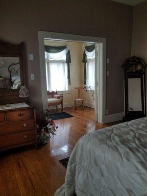 The view from the queen bedroom area into the sunroom.