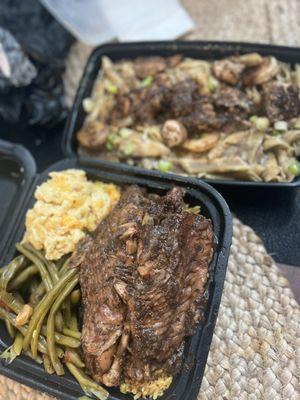 Jerk turkey wings over rice, Mac and cheese, and stewed green beans. Jerk chicken and shrimp pasta.