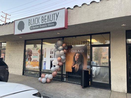 Beauty supply: hair products, hair, and barber supplies.