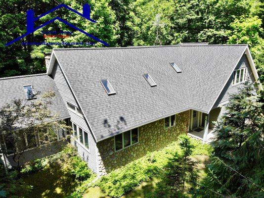 Moire Black Lifetime Warranty Shingles in Union Pier Michiganby Dennison Exterior Solutions & Gutter Topper