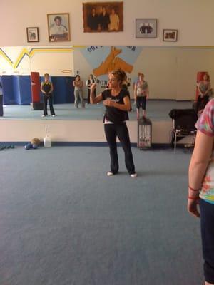 Praise Aerobics founder/owner/trainer leading the class.