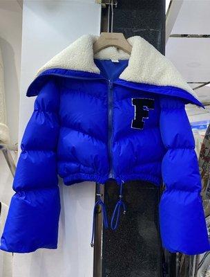 This puffy coat with collar comes in 3 colors, Blue, Green and Black