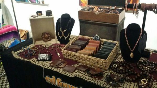 Variety of leather wallets, necklaces, bracelets, and cord holders