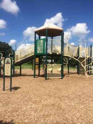 Beautiful 2 playgrounds, basketball, baseball field, bbqs and a paved path for walking and letting kids ride bikes.