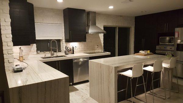 Beautiful White Macaubas Kitchen, 2" mitered edge with bookmatched waterfall legs