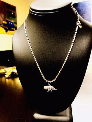 Dino in sterling silver we make and collect a bunch of interesting jewelry come check us out!