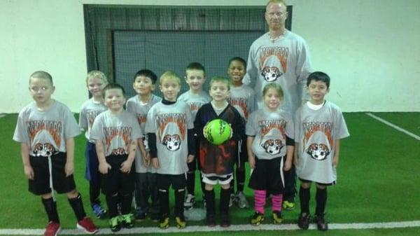 The team wearing spirit jerseys! The kids loved them. Loved that they had their names on the back.