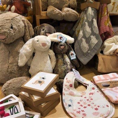 We carry a curated selection of baby items, perfect for gifts.