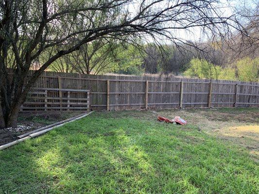 Repair a wood fence