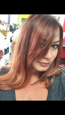 The blend of red, dark red and blonde is perfect! Christine is amazing and so much fun to laugh with!