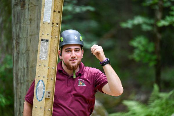 A staff member setting up for a fun camp experience.