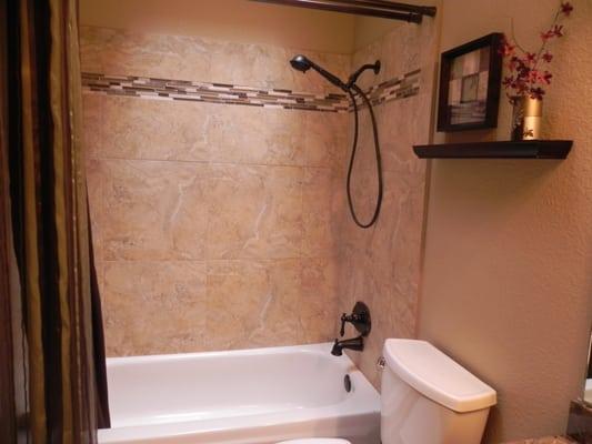 Bathroom Remodel w/ 18" x 18" tiles w/ Glass tile accent