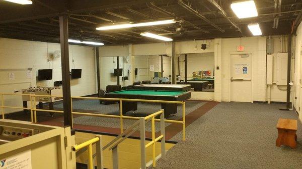 The game room. Pool table, air hockey, Foosball table.