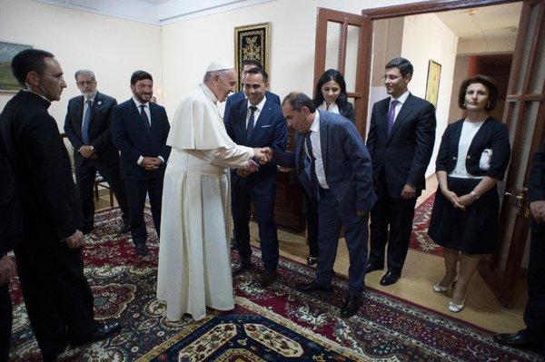 Megerian presents Pope Franicis with a hand woven Megerian Armenian Lori rug