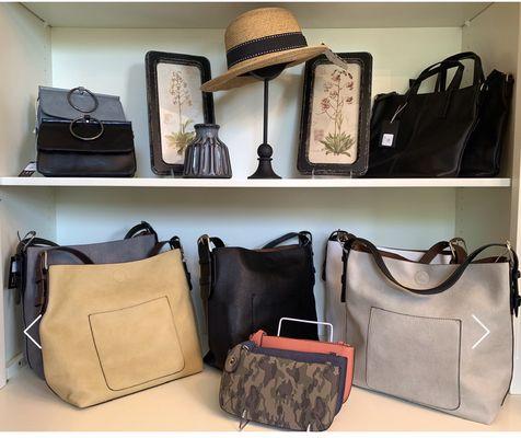 Our Ladies boutique features handbags, loungewear, dresses, scarves and wraps!