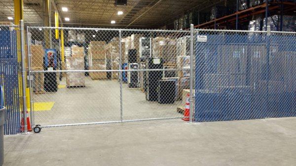 Indoor, industrial 6ft chain-link fence and gate for major bottling company.