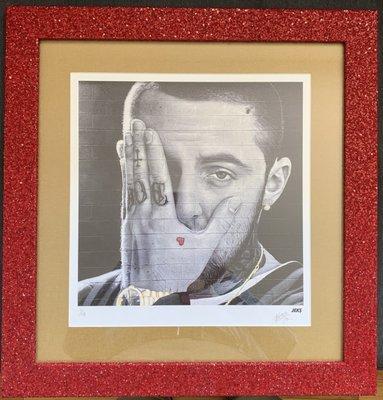 Custom "red bling" frame with gold matting.  This set up pops!