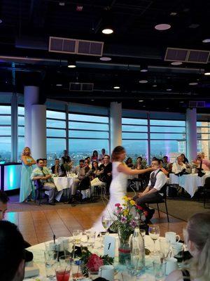 Bride dancing a hula for her husband