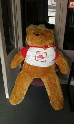 State farm bear welcomes you to their office.