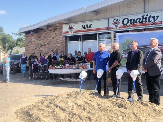 Employees customers and executives pose for Groundbreaking