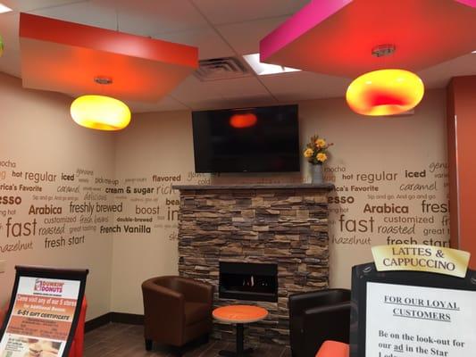 Only Dunkin I've ever seen with fireplace and TV and leather chairs!