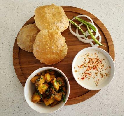 Rice, Aloo, Puri and Raita