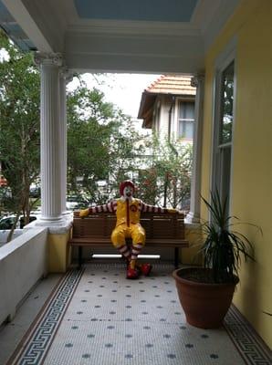 Ronald is chilling on the porch.