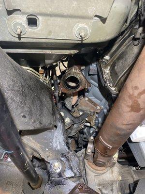 This is the exhaust manifold that was left with a stripped bolt missing nut a additional $400 repair