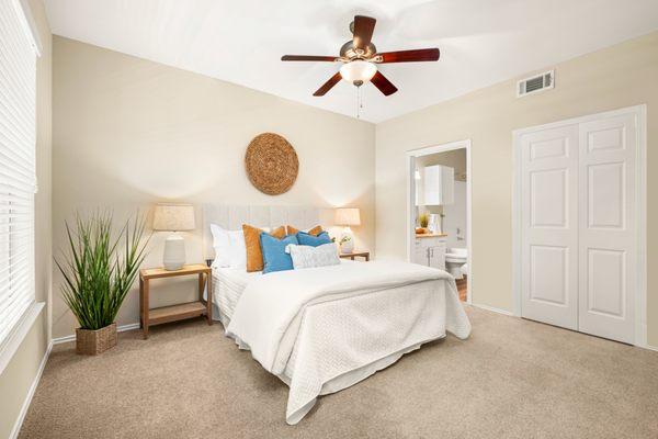 Bedroom with ceiling fan at The Lodge at Shavano Park