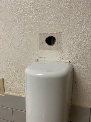 One of the holes in the building! Right above the air dryer near the poorly cleaned restrooms.