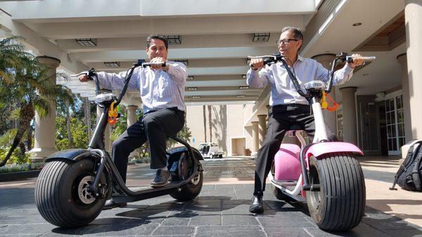 Big bosses rolling our fat tire electric scooters.