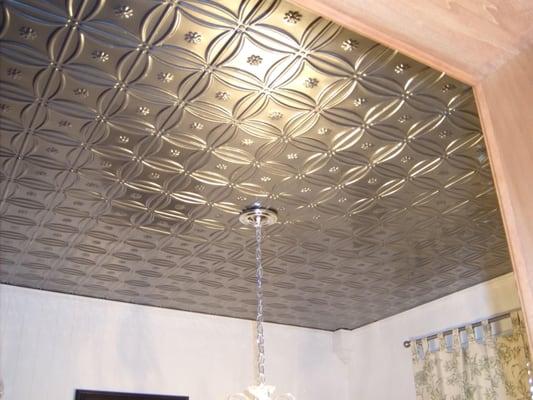 This ceiling made an unbelievable difference to an otherwise always peeling ceiling.  Chandelier was also hung by me...