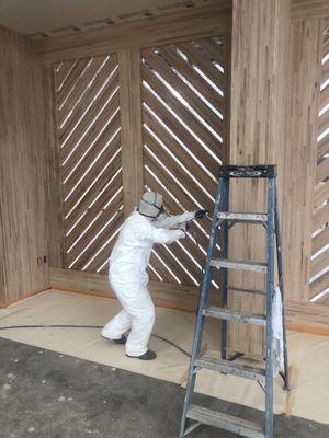 Sanded, Filled in nail holes and layed down a clear coat to protect this amazing wood accent wall