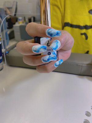 Marble nail design done by our technician