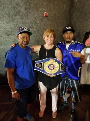 Reggie Barnett Jr and Reggie Barnett Sr with former world women's boxing Champion Christy "The cold miners daughter" Martin.