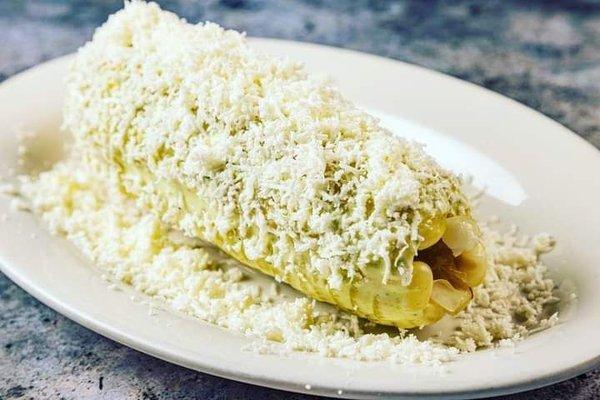 Choclo con Queso Rallado: Peruvian corn with grated cheese