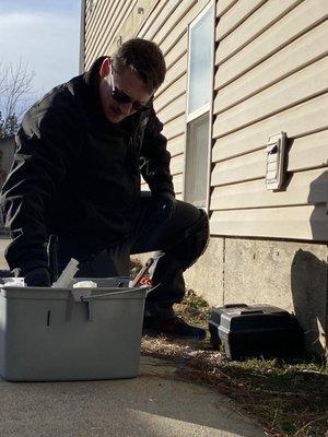 Certified Technician servicing a station