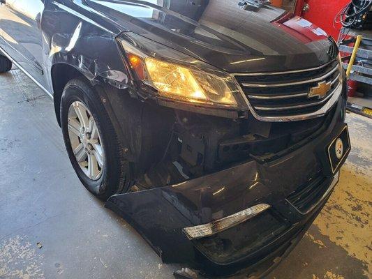 Damage to vehicle from wreck in Albuquerque.