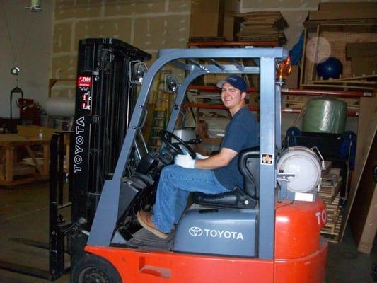 Brian using the forklift