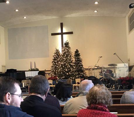 The altar of The Wethersfield Evangelical Free  Church decorated for Christmas.