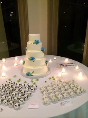 Macarons set up next to the wedding cake