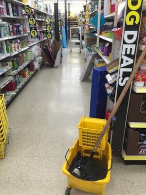 Dirty mop water and cluttered aisles...just another day here!