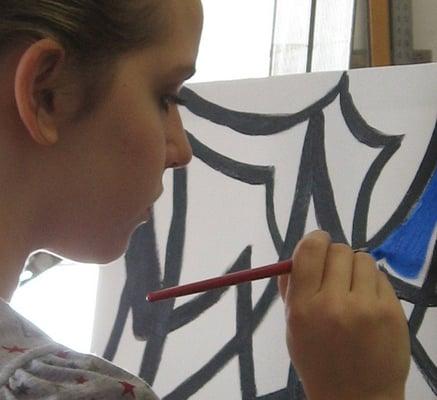 Student hard at work during a painting class at Soldner Fine Art Studio.