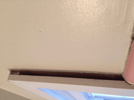 Gaping hole on the top right side of my window that's in my shower. There was no gaping hole before.