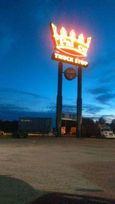 Sign lit up at the corner of Almonaster and Old Gentilly