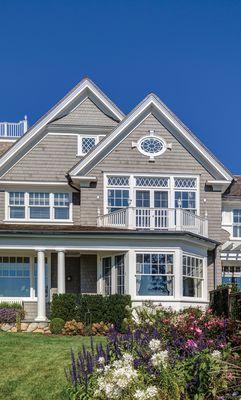 Luxury shingle style colonial with sun porch in Riverside, CT by Davenport Contracting Inc.