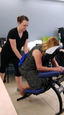 Here is Mattie doing chair massages for an event for nurses week.